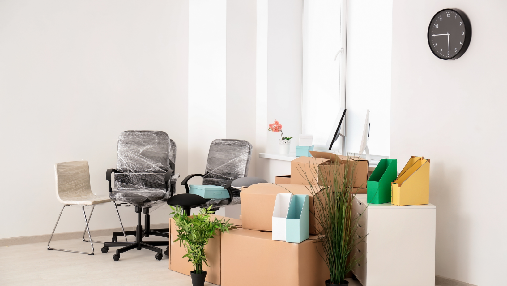 stack of boxes office chairs